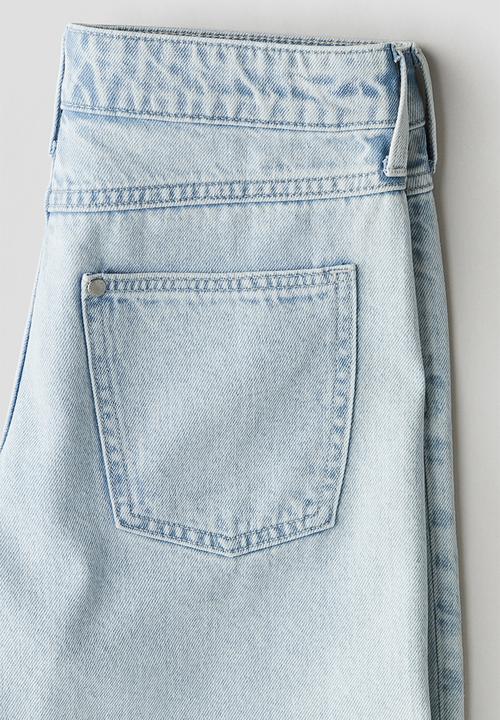 H&M - Keith Haring X H&M:  Loose fit denim shorts - pale denim blue