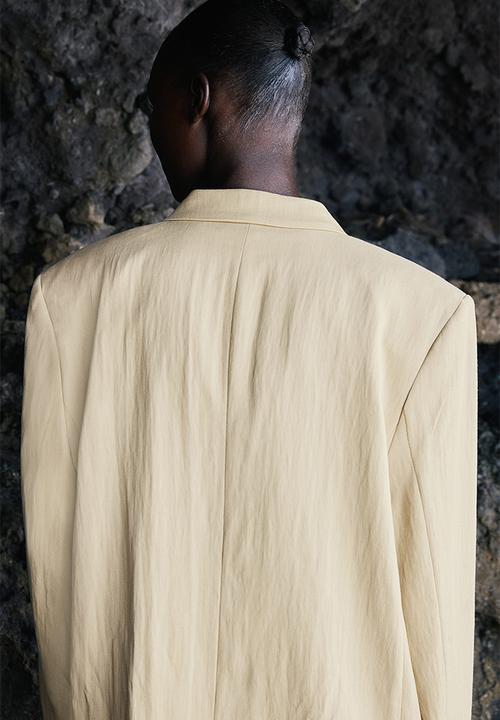 H&M - Oversized blazer - light dusty yellow 