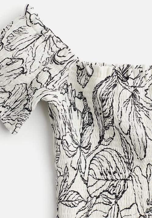 H&M - Linen-blend smocked top - white floral