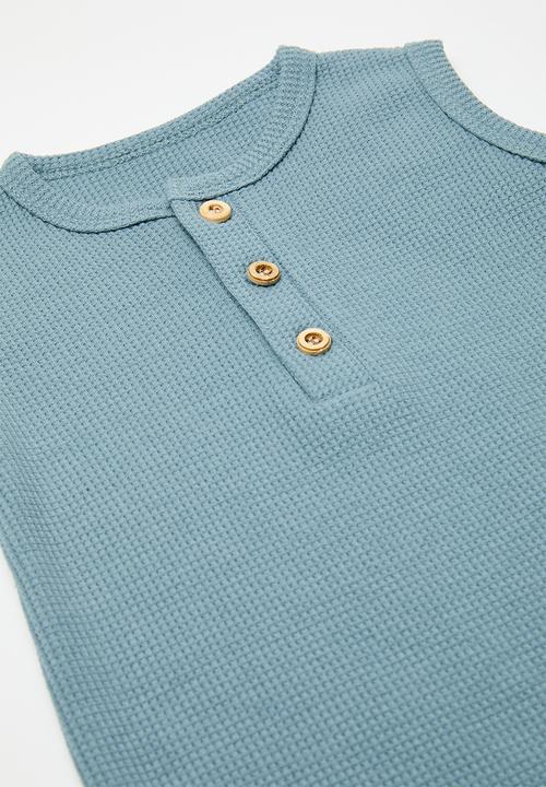 Pop Candy - Half button romper - light blue