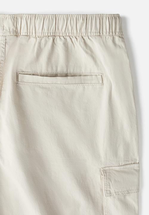 H&M - Relaxed fit cargo trousers - light beige 