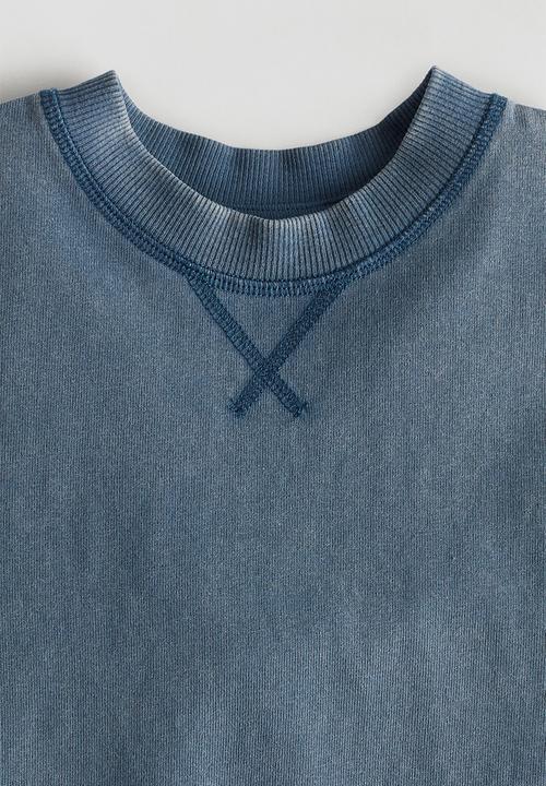 H&M - Keith Haring X H&M:  Washed-look T-shirt - blue