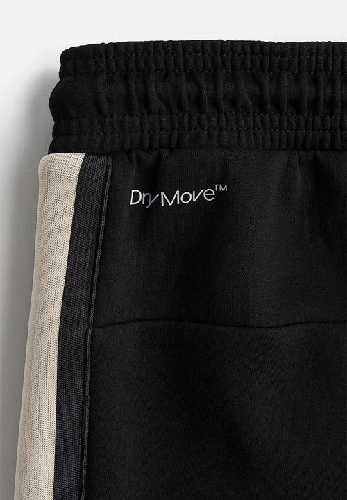 H&M - Regular fit track pants in drymove™ - black