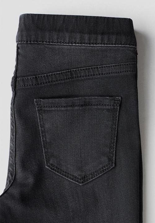 H&M - Superstretch flared leg jeans - charcoal 