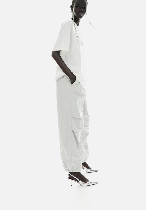H&M - Oversized motif-detail t-shirt - cream & dystopia