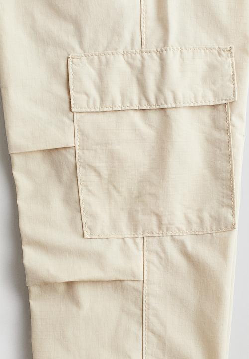 H&M - Cotton cargo trousers - light beige