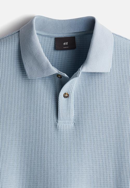 H&M - Slim fit waffled polo shirt - light blue 
