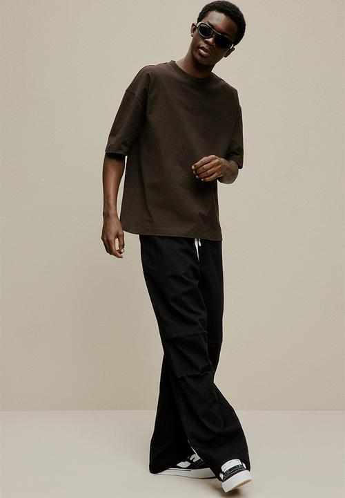 H&M - Loose fit twill trousers - black