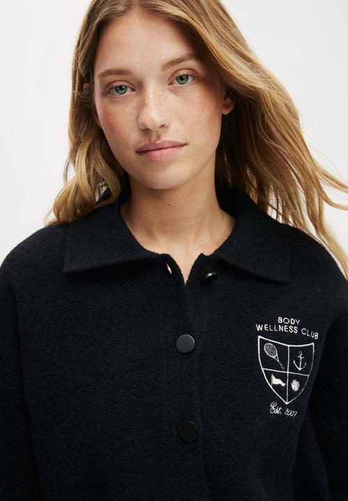 Cotton On - Active Knitted Graphic Bomber - Black/Heritage Club