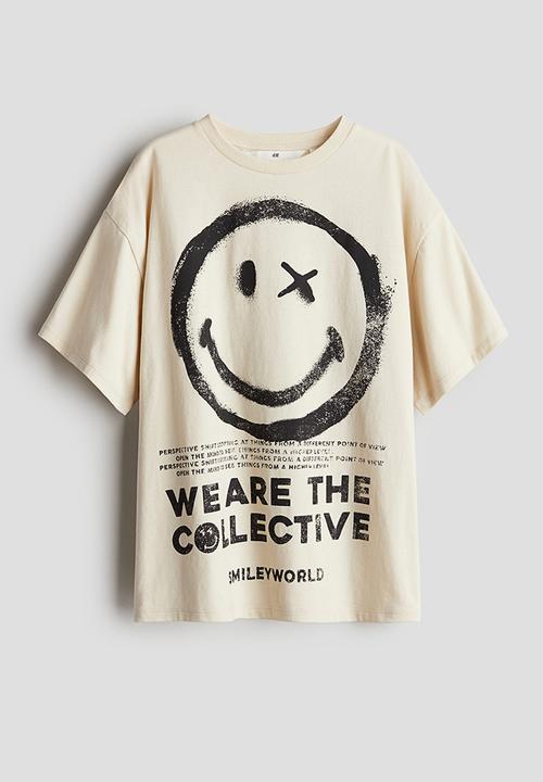 H&M - Oversized printed t-shirt - light beige smileyworld®