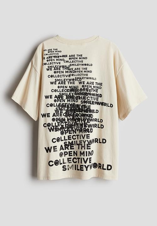 H&M - Oversized printed t-shirt - light beige smileyworld®