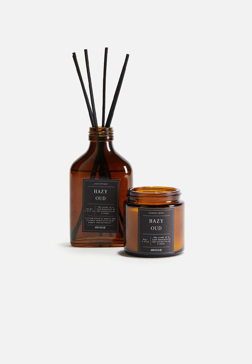 H&M - Small scented candle in glass holder - black/hazy oud