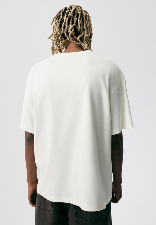 H&M - Loose fit printed T-shirt - cream/online