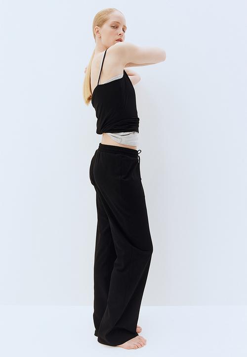 H&M - Straight sweatpants - black