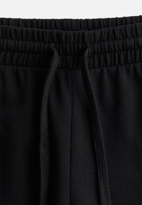 H&M - Straight sweatpants - black