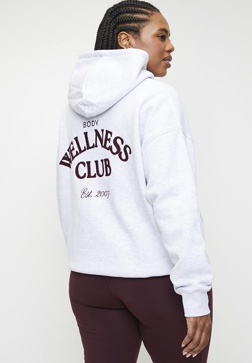 Cotton On - Plus Plush Premium Graphic Hoodie - Cloudy Grey Marle/Heritage Wellness Club