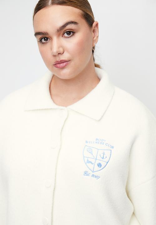 Cotton On - Plus Active Knitted Graphic Bomber - Coconut Milk/Heritage Club