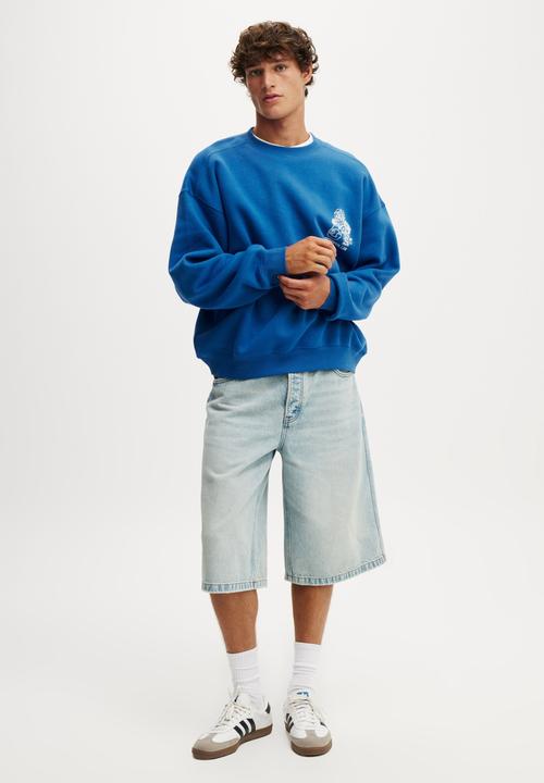 Cotton On - Box fit graphic crew sweater - carolina blue/ldn tigers
