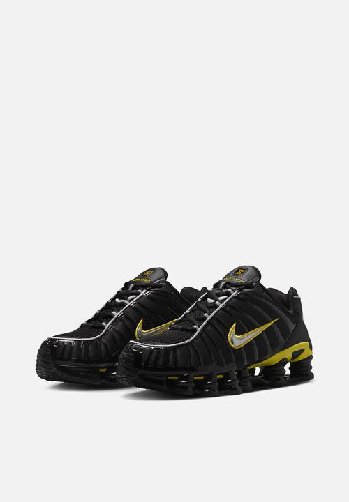 nike shox tl black and gold