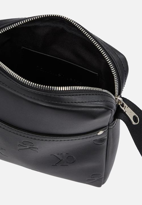 Calvin Klein - All over print Reporter - black
