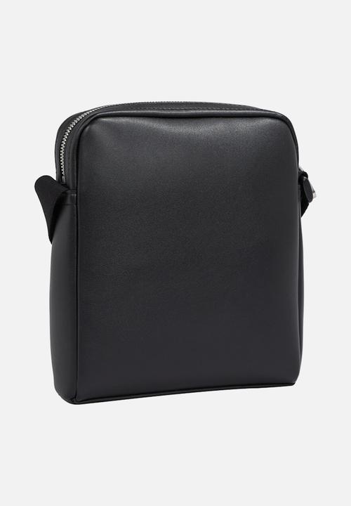 Calvin Klein - All over print Reporter - black