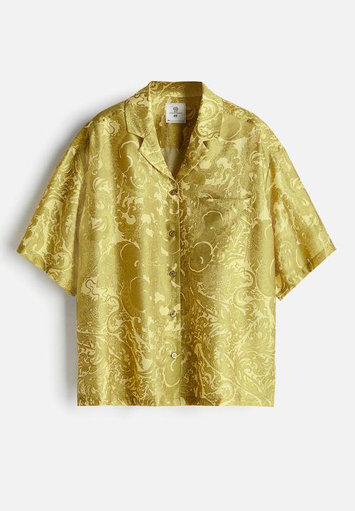 H&M - THE WHITE LOTUS H&M - Patterned resort shirt - yellow-green patterned 