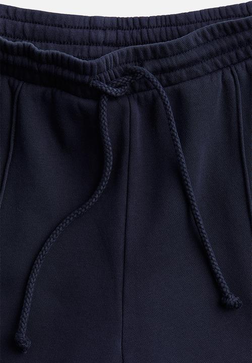 H&M - Crease-front sweatpants - navy blue