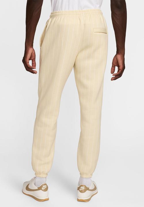 Nike - NSW Club  JDI AOP Cuffed Pant - Lt Khaki