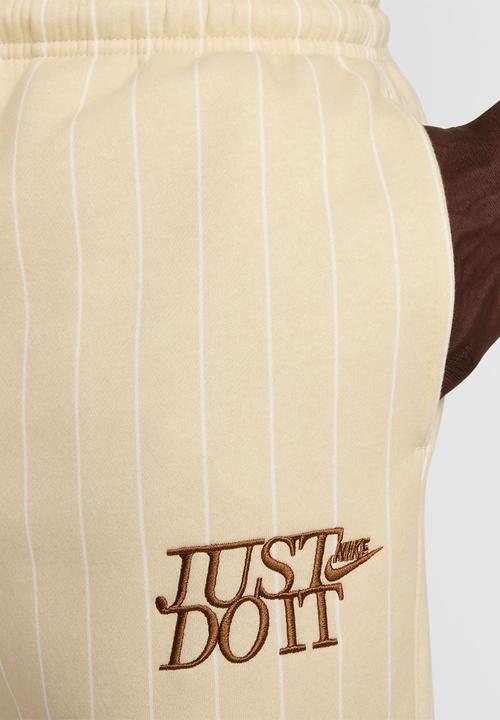 Nike - NSW Club  JDI AOP Cuffed Pant - Lt Khaki