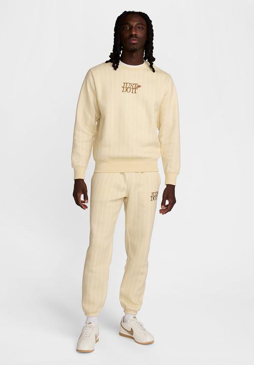 Nike - NSW Club  JDI AOP Cuffed Pant - Lt Khaki