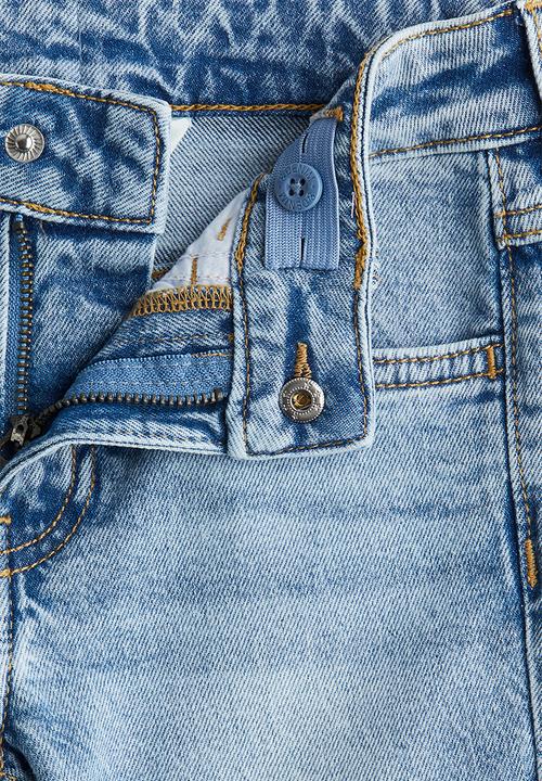 H&M - Relaxed tapered fit jeans - light denim blue 