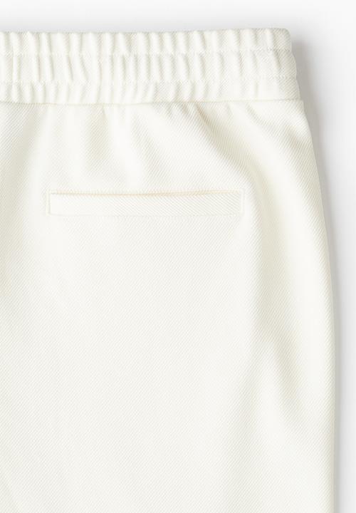 H&M - Slim fit twill joggers - cream