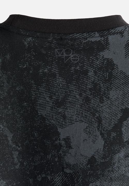 H&M - Loose fit sports top with drymove™ - black patterned