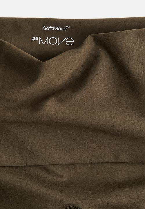 H&M - Flared yoga leggings in softmove™ - khaki green