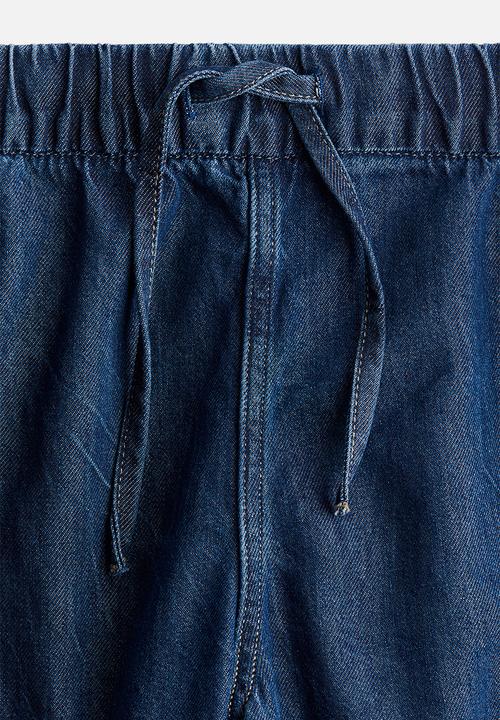 H&M - Denim joggers - denim blue 