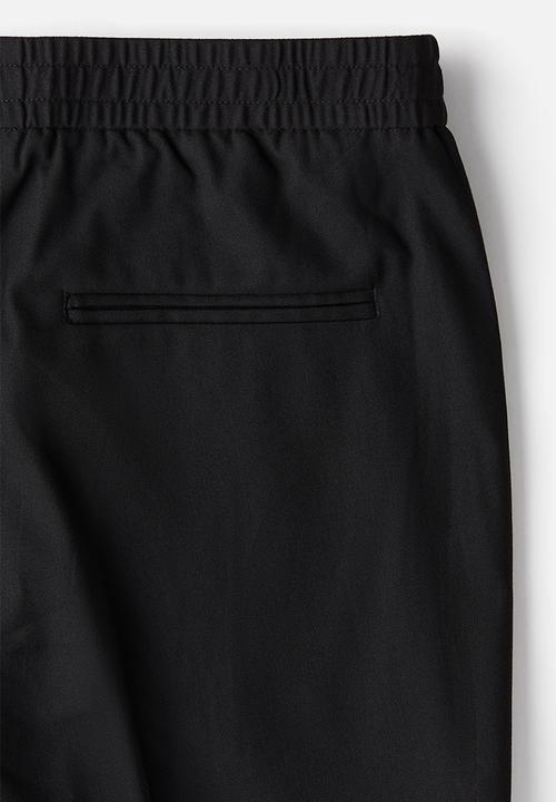 H&M - Slim fit tailored trousers - black