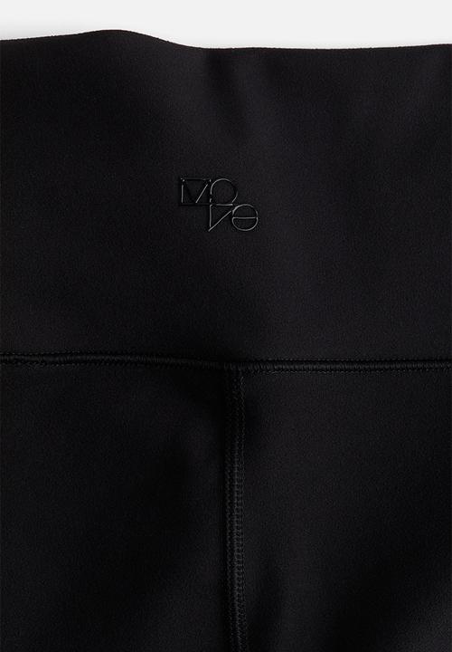 H&M - Flared sports leggings with softmove™ - black