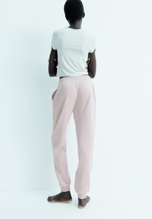 H&M - High-waisted joggers - light pink 