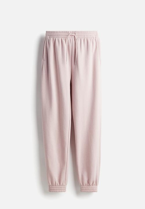 H&M - High-waisted joggers - light pink 