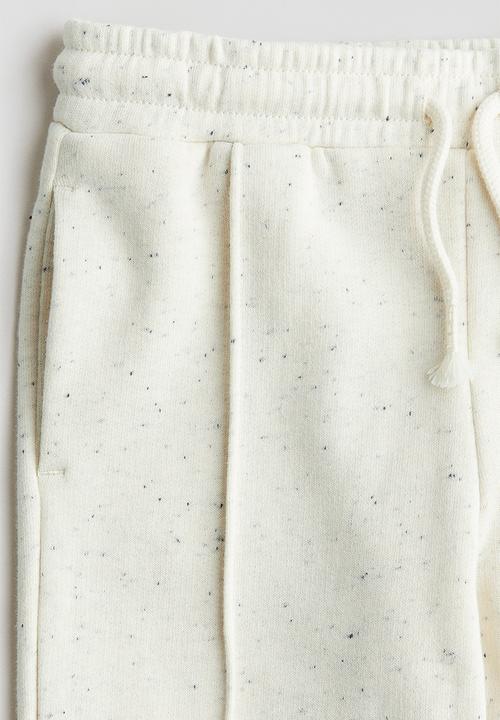 H&M - Crease-leg joggers - light beige 