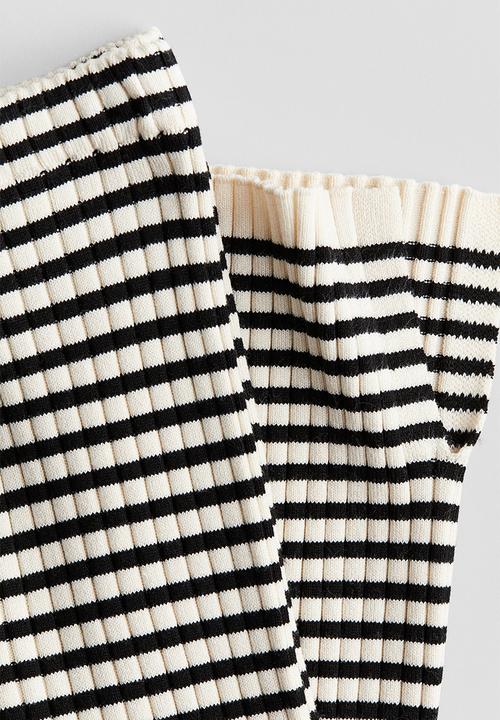 H&M - Flared rib-knit trousers - white/striped