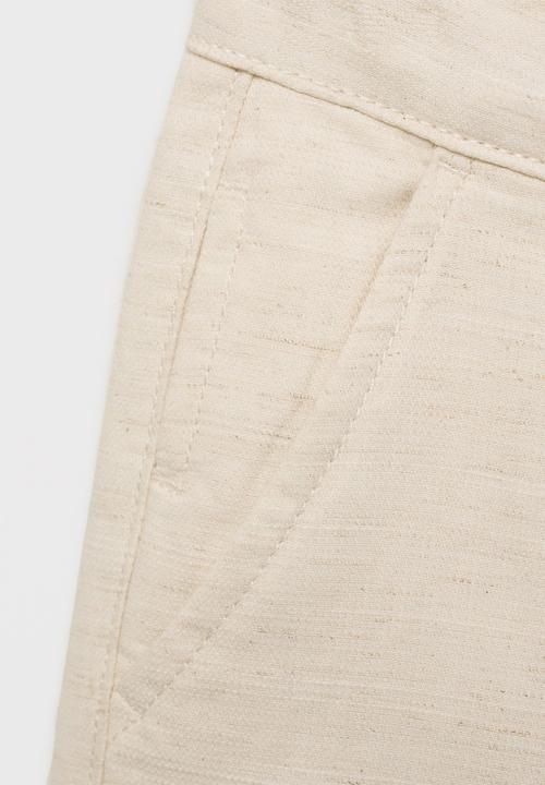 MANGO - Bermudas calatea - light pastel brown