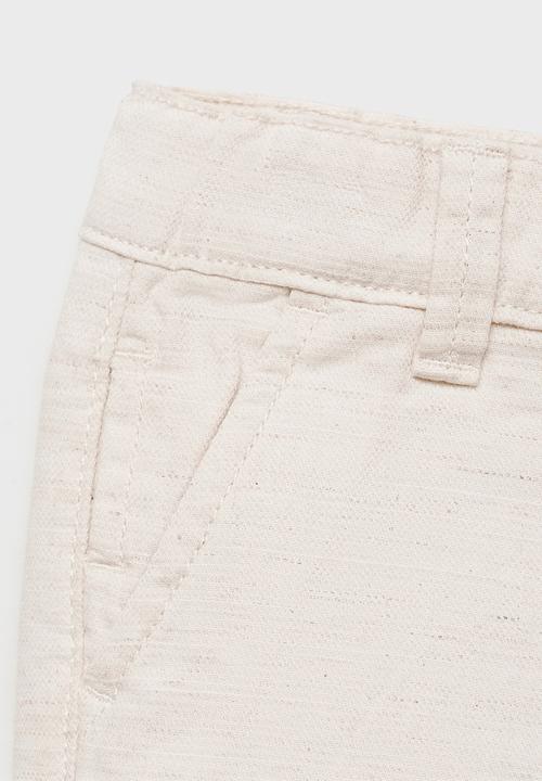 MANGO - Bermudas calateab - light pastel brown