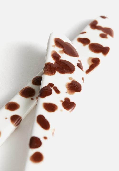 H&M - 2 pack patterned stoneware butter knives -brown/spotted