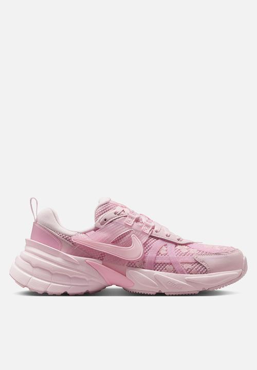 nike pink and white running shoes
