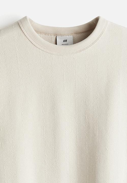 H&M - Regular fit herringbone-patterned sweatshirt - light beige