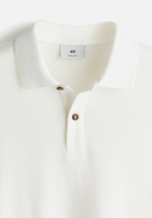 H&M - Regular fit piqué polo shirt - cream