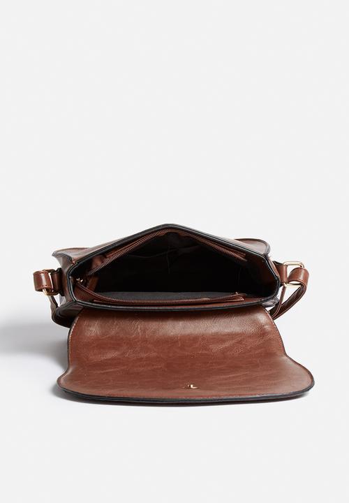 The Lot - Fold & fade slingbag