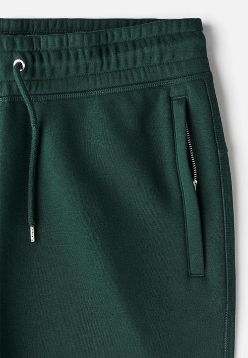 H&M - Thermolite® relaxed fit joggers - forest green