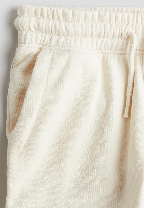 H&M - Brushed-inside cargo joggers - cream